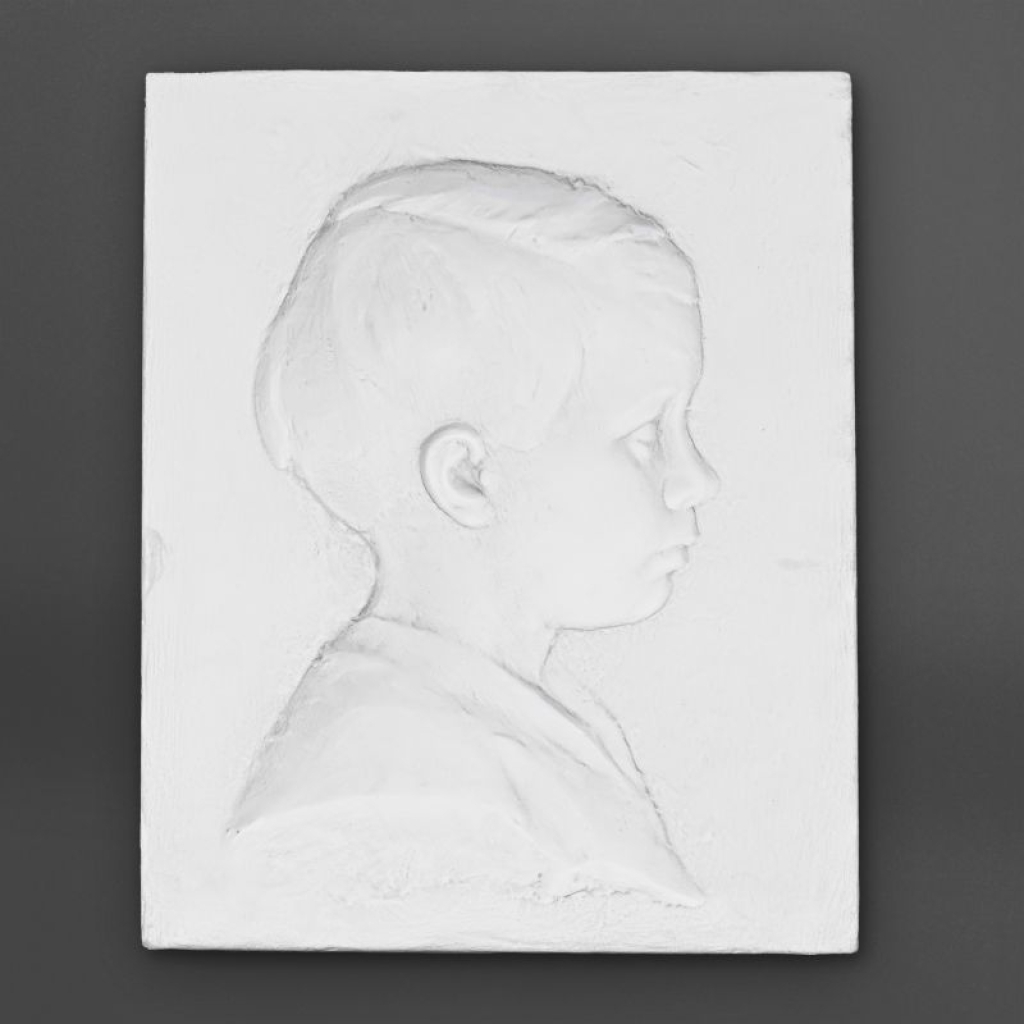 Paire de profil d’enfant en plâtre, XXème siècle. | Biron Paire de profil d’enfant en plâtre, XXème siècle.