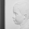 Paire de profil d’enfant en plâtre, XXème siècle. | Biron Paire de profil d’enfant en plâtre, XXème siècle.