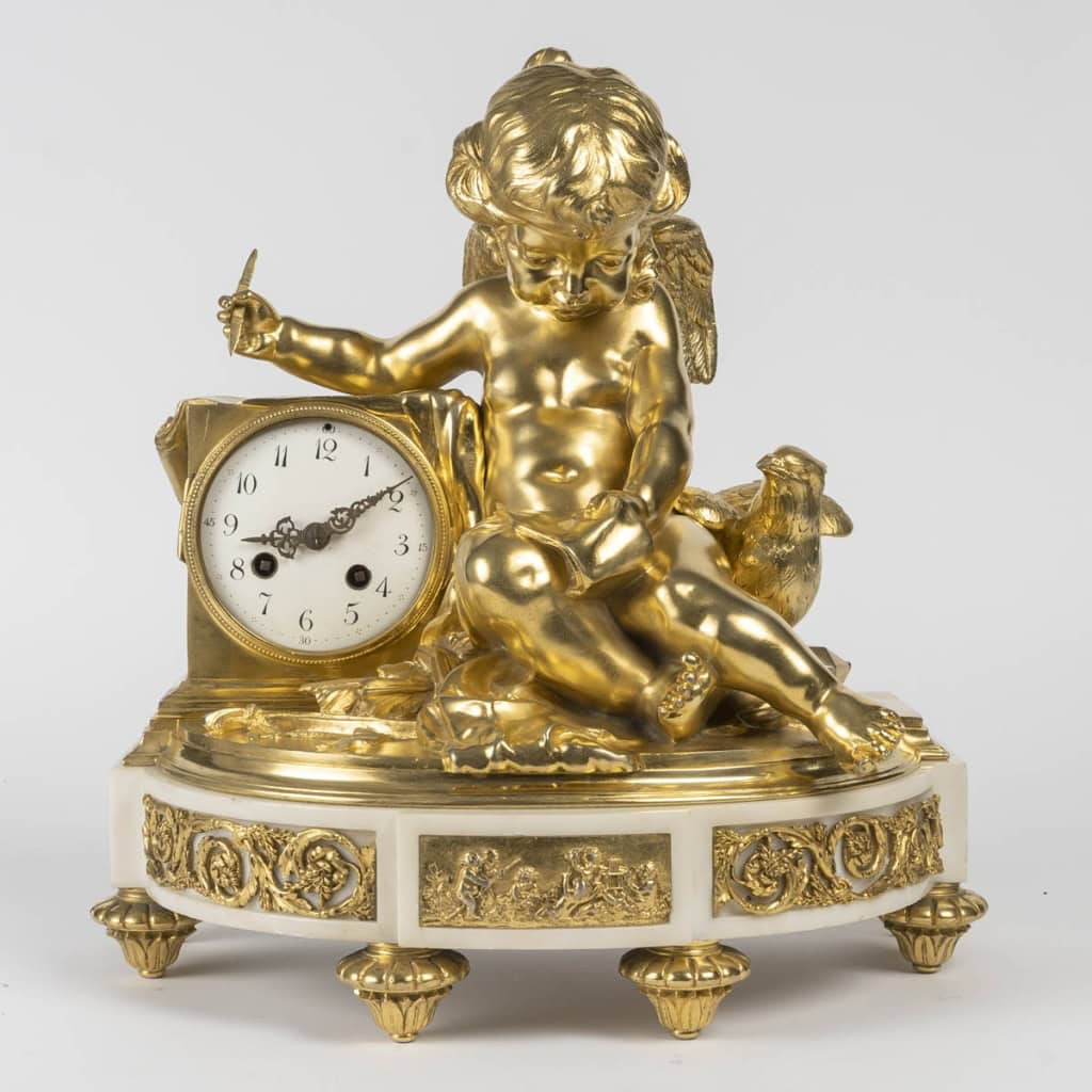 l’Amour Messager- Pendule De Style Louis XVI En Marbre Et Bronze Doré. Modèle De J.-b. Pigalle. | Biron |||||||||