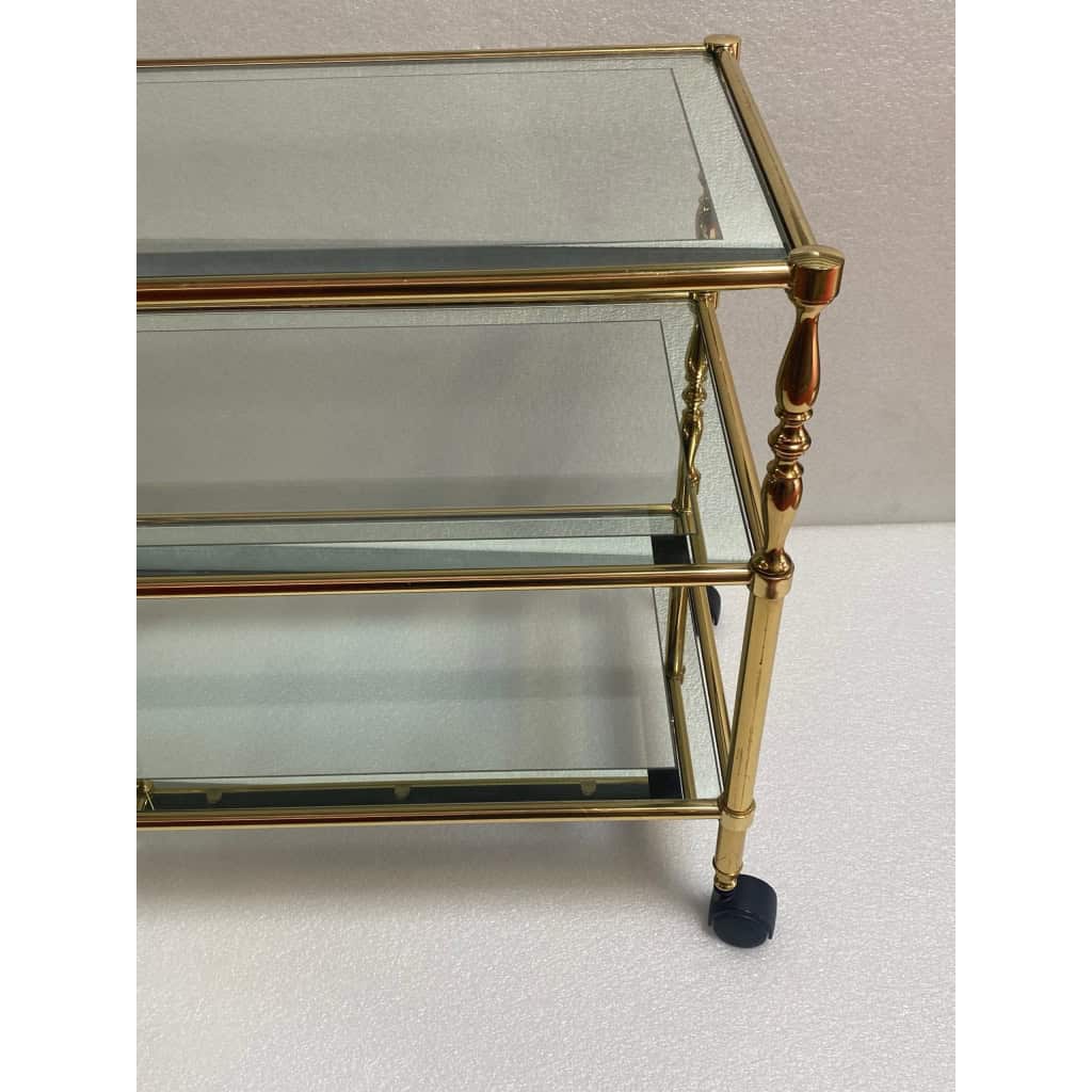 1970′ Desserte a Roulettes en Laiton Doré et Verre Avec Entourage Miroir Maison Jansen | Biron 1970′ Desserte a Roulettes en Laiton Doré et Verre Avec Entourage Miroir Maison Jansen