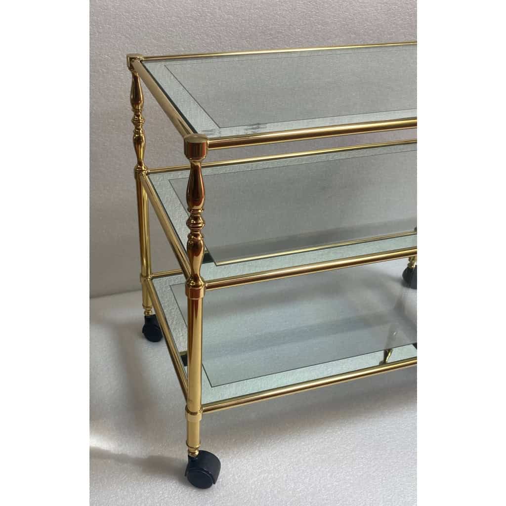 1970′ Desserte a Roulettes en Laiton Doré et Verre Avec Entourage Miroir Maison Jansen | Biron 1970′ Desserte a Roulettes en Laiton Doré et Verre Avec Entourage Miroir Maison Jansen