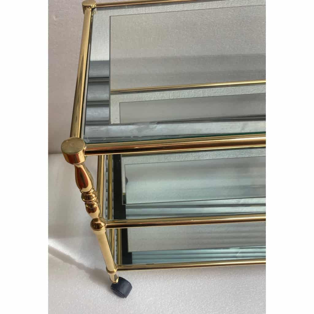 1970′ Desserte a Roulettes en Laiton Doré et Verre Avec Entourage Miroir Maison Jansen | Biron 1970′ Desserte a Roulettes en Laiton Doré et Verre Avec Entourage Miroir Maison Jansen