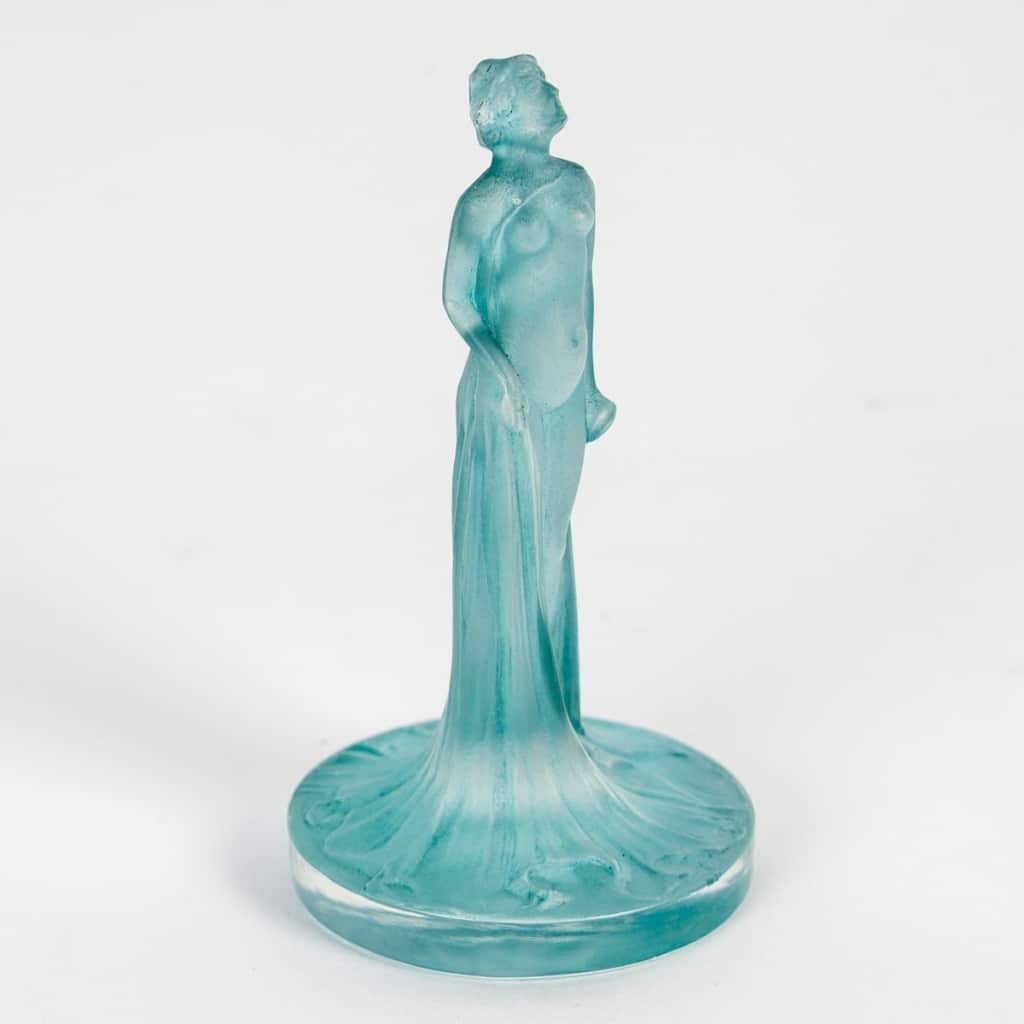 Stamp “Draped Statuette” in white glass with turquoise blue patina by René LALIQUE | Biron