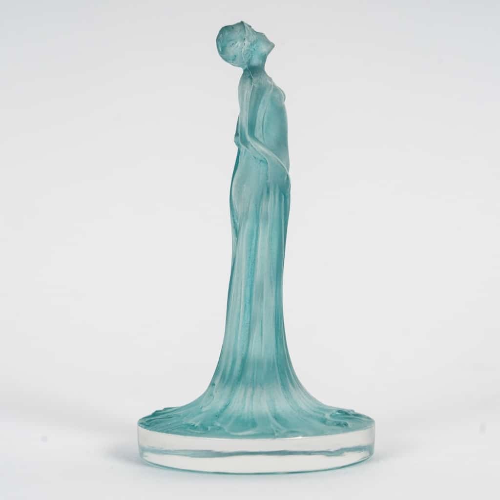 Stamp “Draped Statuette” in white glass with turquoise blue patina by René LALIQUE | Biron
