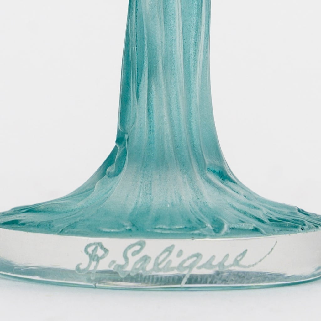 Stamp “Draped Statuette” in white glass with turquoise blue patina by René LALIQUE | Biron