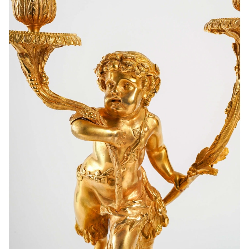 Paire de candélabres de style Louis XVI en bronze doré Amour et Faune d’après Clodion et Delarue vers 1850-1860 | Biron 