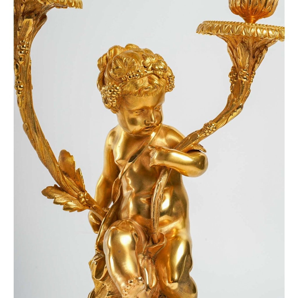 Paire de candélabres de style Louis XVI en bronze doré Amour et Faune d’après Clodion et Delarue vers 1850-1860 | Biron 