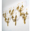 Série de six appliques à trois lumières de style Louis XV en bronze ciselé et doré vers 1880-1890 | Biron 