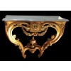 Console d’applique d’époque Transition Louis XV/Louis XVI bois sculpté doré dessus de marbre bleu turquin | Biron 