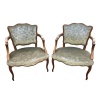 Paire de fauteuils à coiffer de style Louis XV à dossier cabriolet de forme chantournée en hêtre mouluré. | Biron 