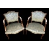 Paire de fauteuils à coiffer de style Louis XV à dossier cabriolet de forme chantournée en hêtre mouluré. | Biron 
