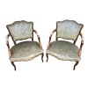 Paire de fauteuils à coiffer de style Louis XV à dossier cabriolet de forme chantournée en hêtre mouluré. | Biron 