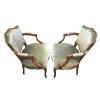 Paire de fauteuils à coiffer de style Louis XV à dossier cabriolet de forme chantournée en hêtre mouluré. | Biron 