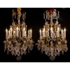 Signé par les Cristalleries de Baccarat paire de lustres de style Louis XV en bronze doré et cristal taillé vers 1880-1890 | Biron 