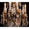 Signé par les Cristalleries de Baccarat paire de lustres de style Louis XV en bronze doré et cristal taillé vers 1880-1890 | Biron 