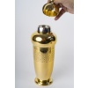 TETARD Frères – SHAKER en Vermeil XXe ART DECO | Biron TETARD Frères - SHAKER en Vermeil XXe ART DECO SHAKER en vermeil reposant sur un piédouche rond le corps de forme ovoïde est gravé à mi-corps d’un décor géométrique sur deux frises, renflé au niveau de la grille intérieur et recouvert d’un chapeau surmonté d’une sphère. Dimensions : hauteur 30 cm – base diamètre 8,5 cm Matériel : Argent vermeil 1er titre 950/°°° Poids : 896 grammes Poinçon : MINERVE Epoque : XXe vers 1930 Orfèvre : TETARD Frères à PARIS Origine : France/Paris