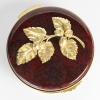 Boite en porcelaine cerclé d’une monture en bronze signé Paul Millet, période art nouveau. | Biron 