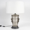 Lampe « Pan – Faune » cristal blanc patiné gris de Marc LALIQUE | Biron 