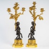 Paire de candélabres de style Louis XVI en bronze à décor de Faunes, montés en lampes | Biron 