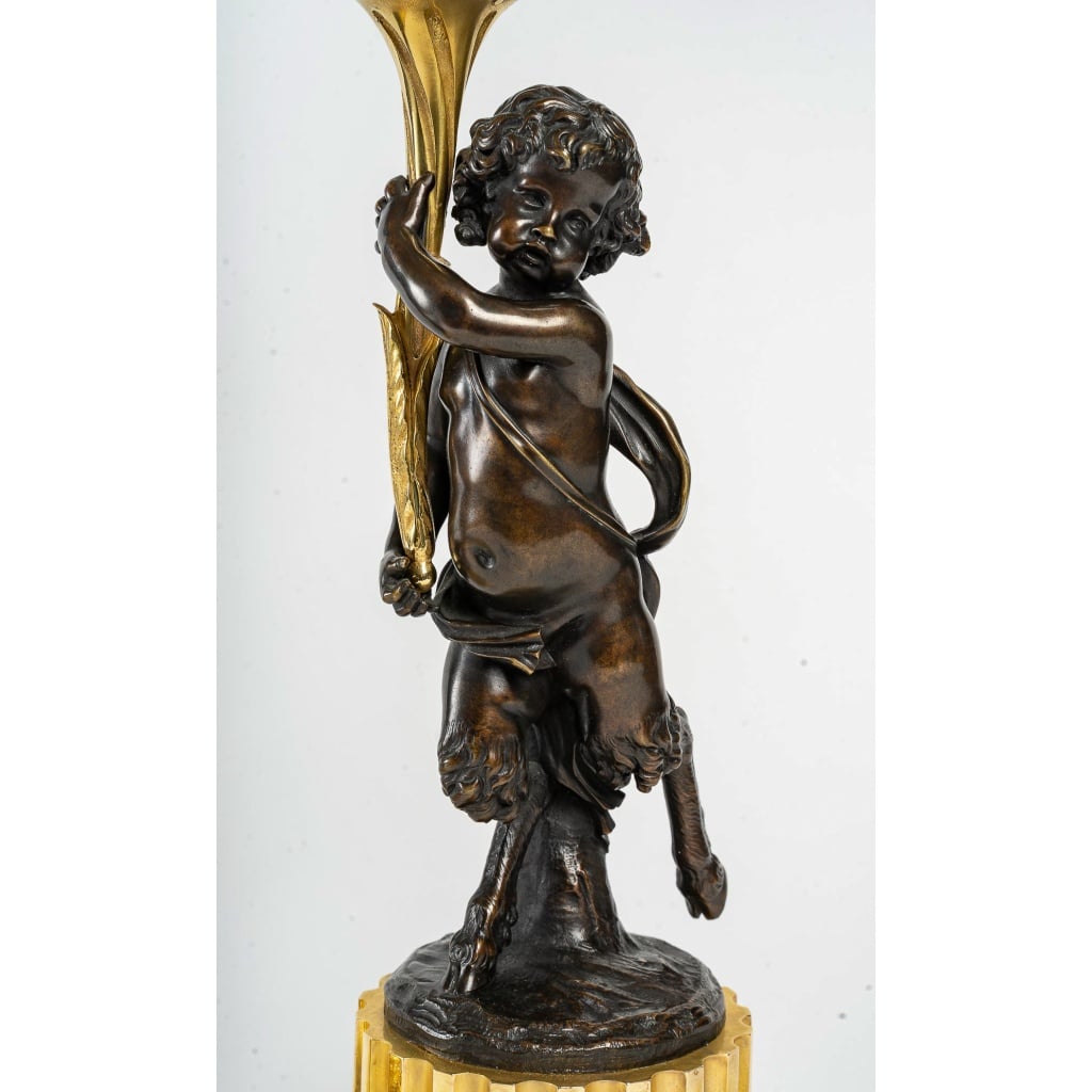 Paire de candélabres de style Louis XVI en bronze à décor de Faunes, montés en lampes | Biron 