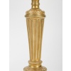 Paire de bougeoirs en bronze doré d’époque Louis XVI à décor de cannelures, montée en lampes | Biron 