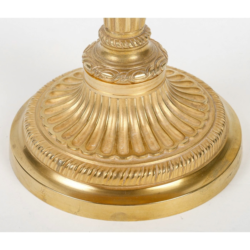 Paire de bougeoirs en bronze doré d’époque Louis XVI à décor de cannelures, montée en lampes | Biron 