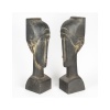 Paire de sculptures en terre cuite dans le goût de Modigliani, XXème siècle. | Biron 