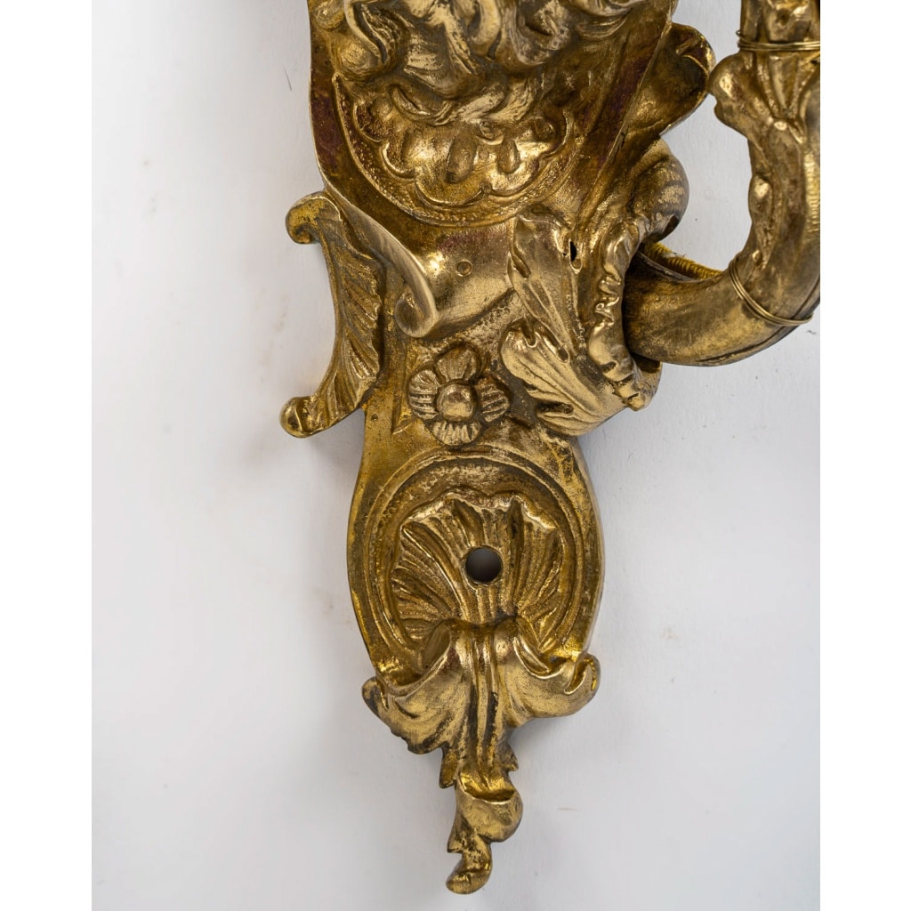 Paire d’appliques dite Aux Zéphyrs en bronze ciselé et doré XIXème siècle | Biron 