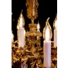 Victor Raulin (1867-1925) et Baccarat Lustre aux Amours en bronze ciselé et doré de style Louis XV | Biron 