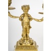 Paire de candélabres de style Louis XVI aux petits faunes. Epoque XIX | Biron 