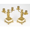 Paire de candélabres de style Louis XVI aux petits faunes. Epoque XIX | Biron 