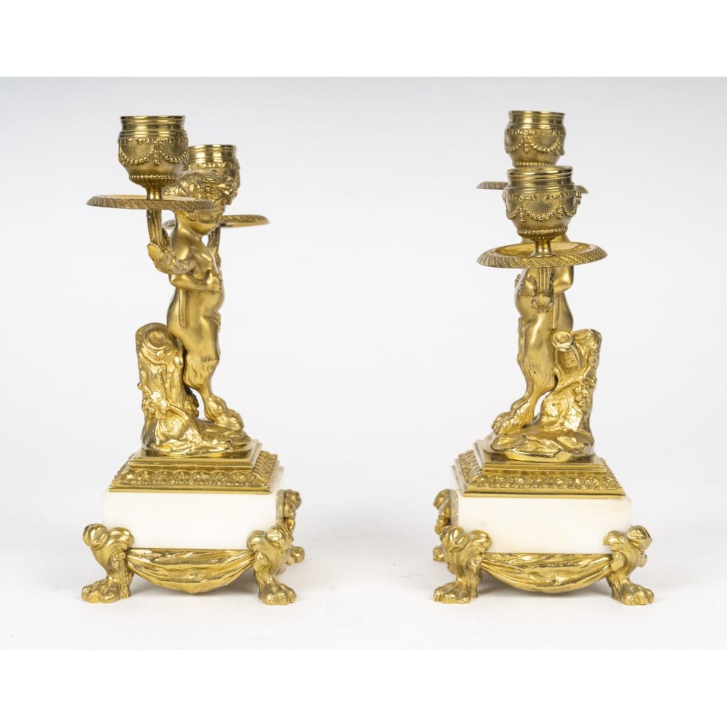 Paire de candélabres de style Louis XVI aux petits faunes. Epoque XIX | Biron 