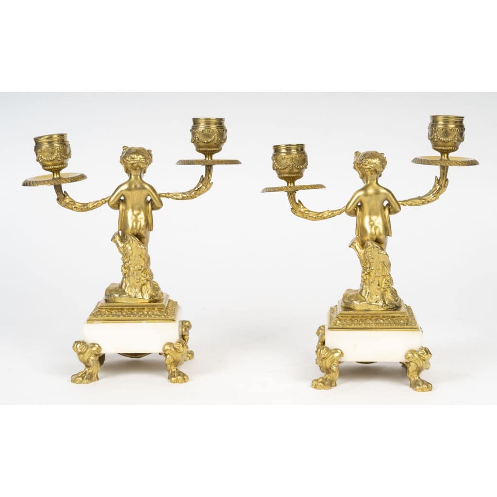 Paire de candélabres de style Louis XVI aux petits faunes. Epoque XIX | Biron 