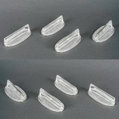 Suite de 8 Porte-Couteaux "Nippon" verre blanc de René LALIQUE