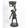 Grand bronze porte-lampe à l’huile représentant Silène, œuvre du XIXe siècle, à patine brune, tirée de l’Antique. | Biron 