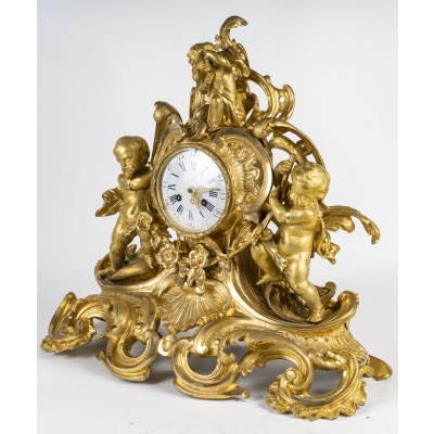 POPON, à Paris- Aurore, Pendule à poser Néo-Louis XV en bronze doré.Circa 1860.