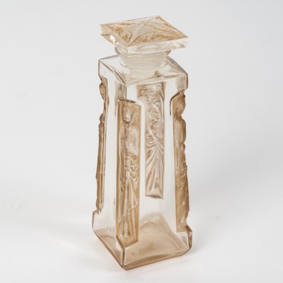 Flacon "Quatre Aigles" verre blanc patiné sépia de René LALIQUE