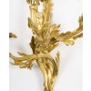 Importante paire d’appliques signée Raingo, en bronze doré de style Louis XV, XIXème. 11