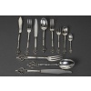 CARDEILHAC - MENAGERE 150 PIECES EN ARGENT MASSIF MODELE " RENAISSANCE" XXe Le manche repercé est orné d'un mascaron seules les cuillères a moka ne sont pas repercées. Commande faite pour l'exportation . Poinçons : STERLING FRANCE A 925 - Poinçon de Maître de CARDEILHAC - Poinçon d'exportation de CHRISTOFLE ( OC) Poinçon de C. CHRISTOFLE dans un losange. POIDS : Poids des pièces de table 6Kg 144 grs + poids des pièces de service 1 Kg 471 POIDS NET TOTAL : 7 Kgs 615 grammes POIDS BRUT DES COUTEAUX : 1 kg 542 grs Composition :  12 FOURCHETTES DE TABLE  12 CUILLERES DE TABLE  12 COUTEAUX DE TABLE  12 FOURCHETTES A POISSON  12 COUTEAUX A POISSON  12 CUILLERES A ENTREMET  12 FOURCHETTES A ENTREMET  12 COUTEAUX A ENTREMET  12 FOURCHETTES A GATEAUX  12 CUILLERES A MOKA  12 CUILLERES A THE / CAFE + 18 PIECES DE SERVICE soit : - 1 COUVERT A SALADE 2 PIECES  1 CUILLERE A SAUCE  1 PELLE A TARTE  1 COUVERT A POISSON 2 PIECES  1 LOUCHE  4 PIECES DE SERVICE DE TABLE  1 COUTEAU A BEURRE  1 COUTEAU A FROMAGE  1 PINCE A SUCRE  4 PIQUES A HORS D’ŒUVRES En 1951, la maison Cardeilhac est rachetée par Christofle, qui perpétue une partie de ses modèles et conserve l’héritage de son savoir-faire. Aujourd’hui, les pièces signées Cardeilhac sont très recherchées pour leur élégance et leur qualité de fabrication, illustrant l’âge d’or de l’orfèvrerie française.