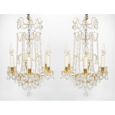 Paire de lustres en bronze doré et cristal de style Louis XVI, d’époque XIXème.
