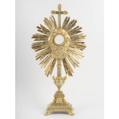 Ostensoir en bronze doré à décor de chérubins, XIXème siècle.