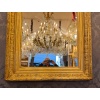 Grand miroir Louis XVI en bois sculpté et doré de la fin du XVIIIème siècle 24 Grand miroir Louis XVI en bois sculpté et doré de la fin du XVIIIème siècle 24