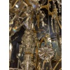 Important lustre signé Baccarat de style Louis XV en bronze doré et décor de cristal taillé vers 1880-1890 26 Important lustre signé Baccarat de style Louis XV en bronze doré et décor de cristal taillé vers 1880-1890 26