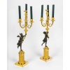 Paire de candélabres en bronze à décor de Figures à l’Antiques, époque Empire vers 1805-1810 26 Paire de candélabres en bronze à décor de Figures à l’Antiques, époque Empire vers 1805-1810 26