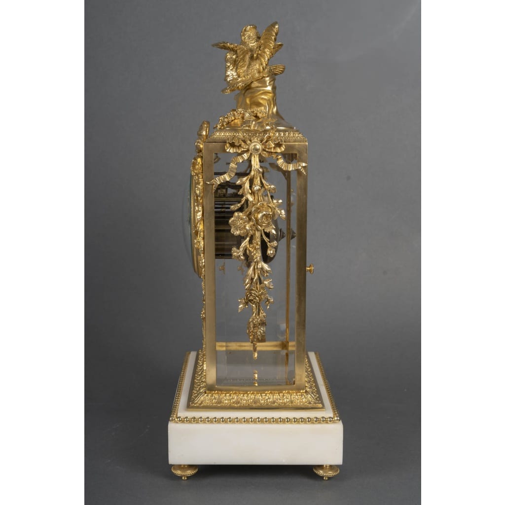 Une garniture de cheminée en bronze doré et marbre blanc, XIXème siècle 4