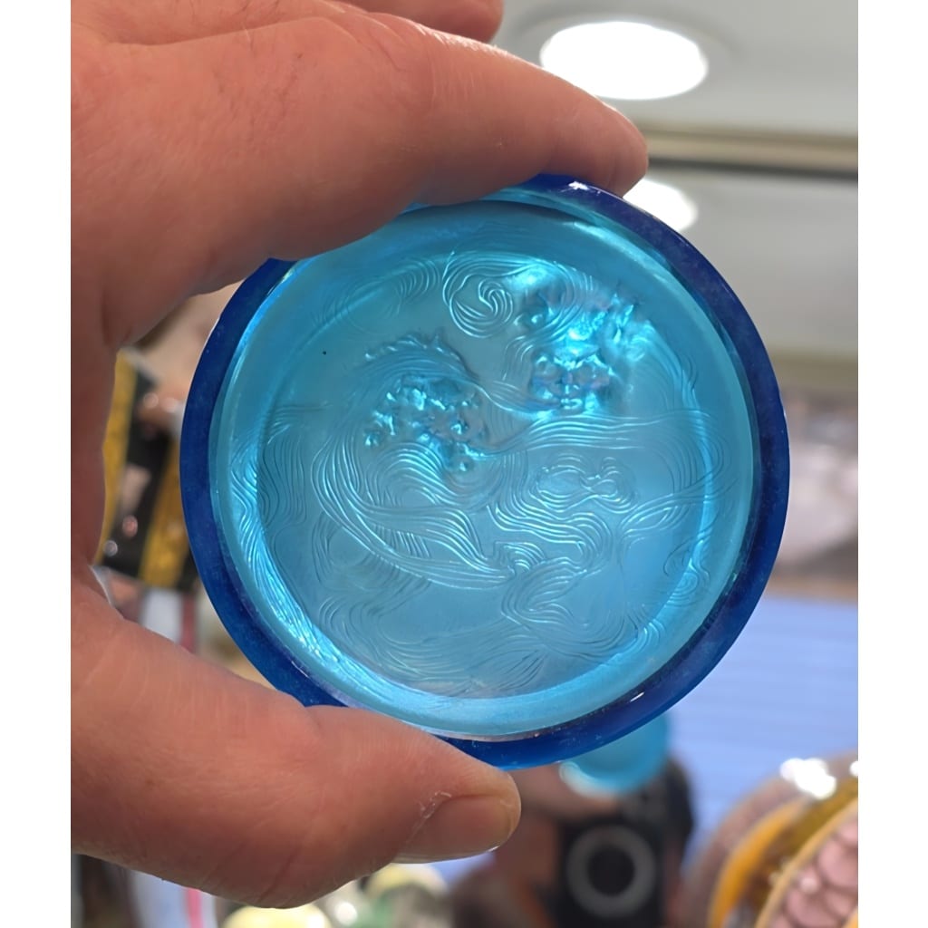 René Lalique (1860–1945) Suite exceptionnelle de cinq cendriers « Deux Zéphirs » Modèle créé en 1913 11 René Lalique (1860–1945) Suite exceptionnelle de cinq cendriers « Deux Zéphirs » Modèle créé en 1913 11