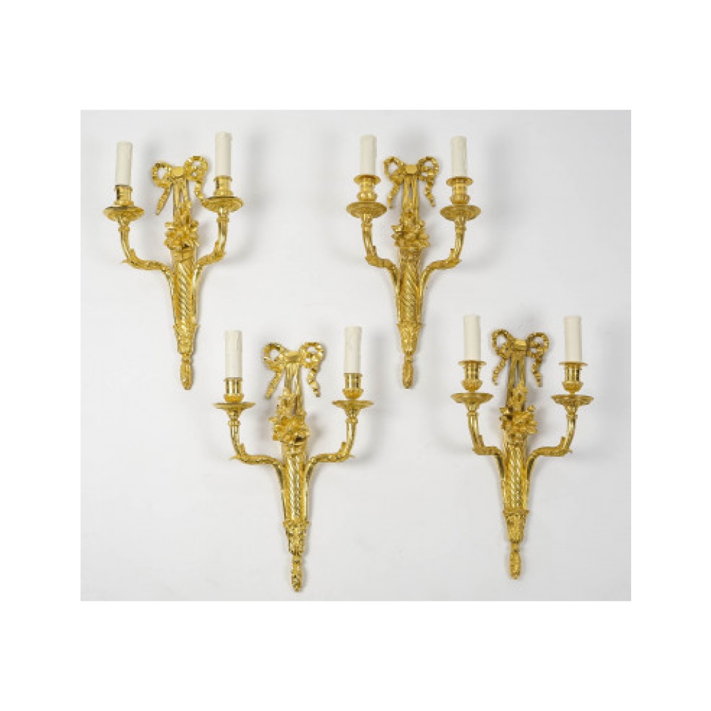 Suite de quatre appliques de style Louis XVI. XIXème siècle.